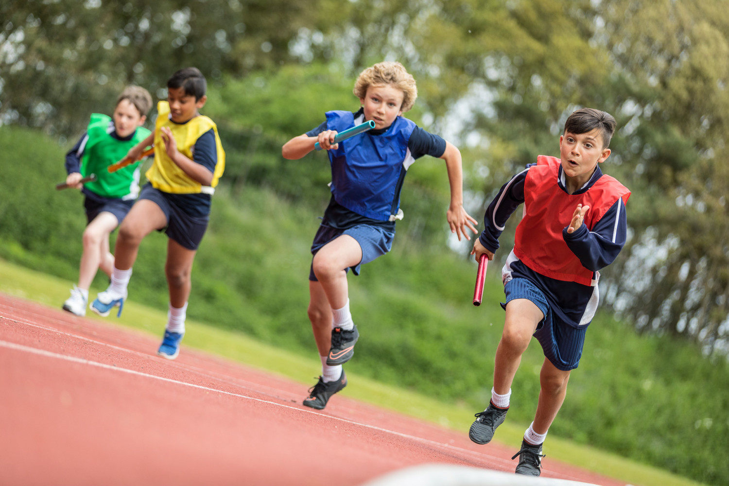 children running relay race